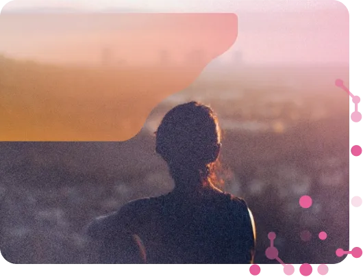 Woman overlooking a city